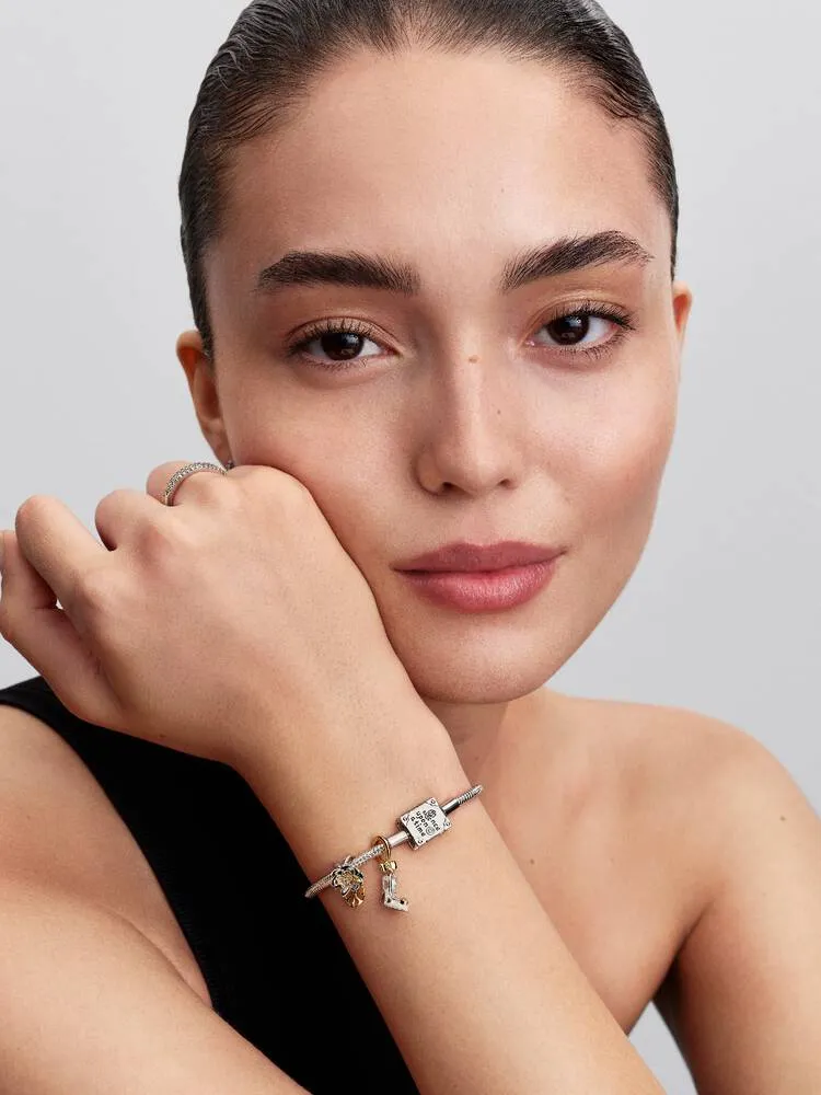 Disney Tiana sterling silver and 14k gold-plated charm with 0.012 ct TW G-I VS+ round brilliant very good cut lab-grown diamond/ 764326C01