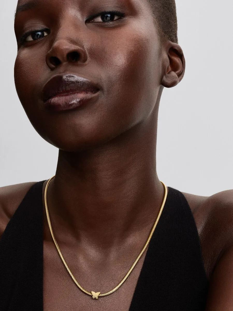 Textured butterfly 14k gold-plated mini charm / 764046C00