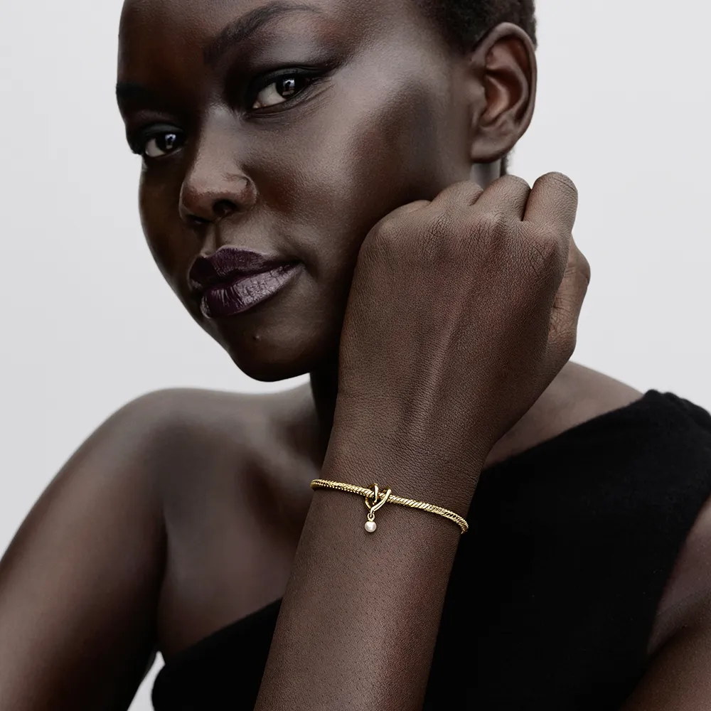 Wrapped heart 14k gold-plated charm with white lac