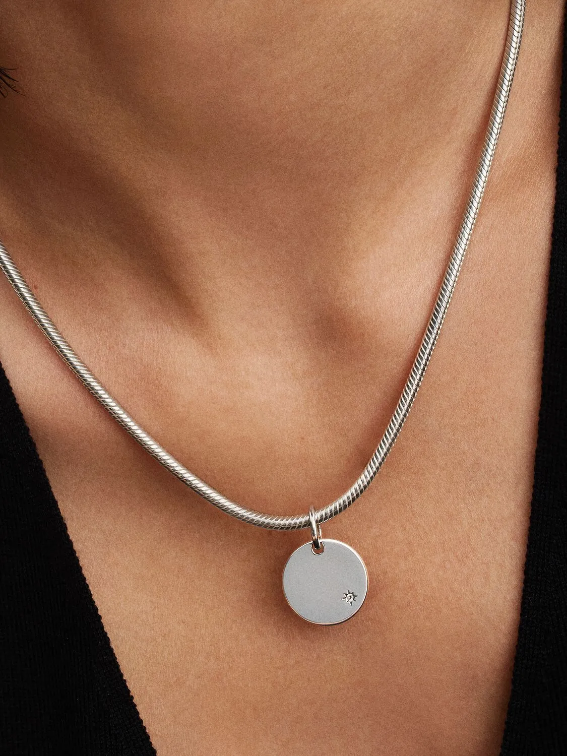 Engravable round sterling silver pendant with 0.01