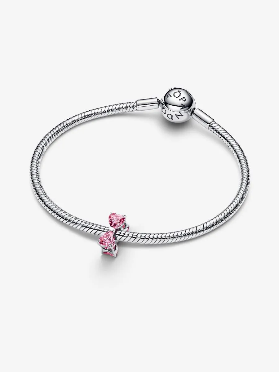 Bow sterling silver with fancy pink and clear cubic zirconia set