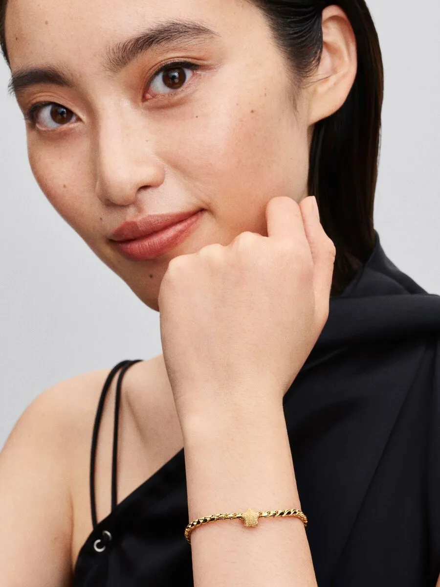 Textured star 14k gold-plated mini charm / 764050C00