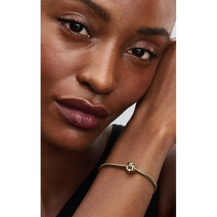 Infinity knot 14k gold-plated charm