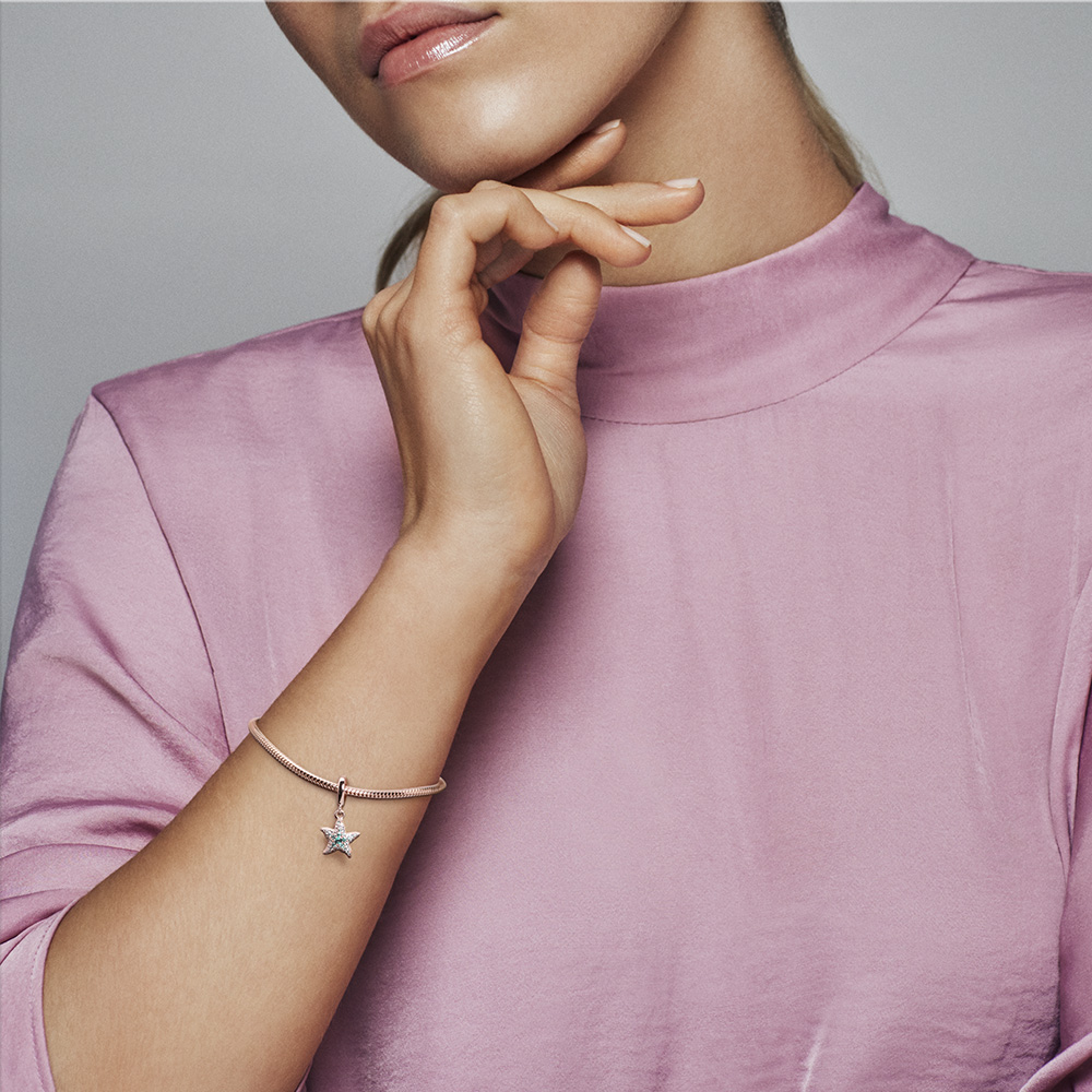Starfish 14k rose gold-plated dangle with icy blue