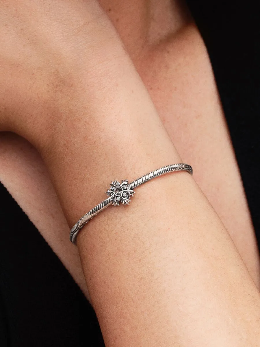Snowflake sterling silver charm with clear cubic z