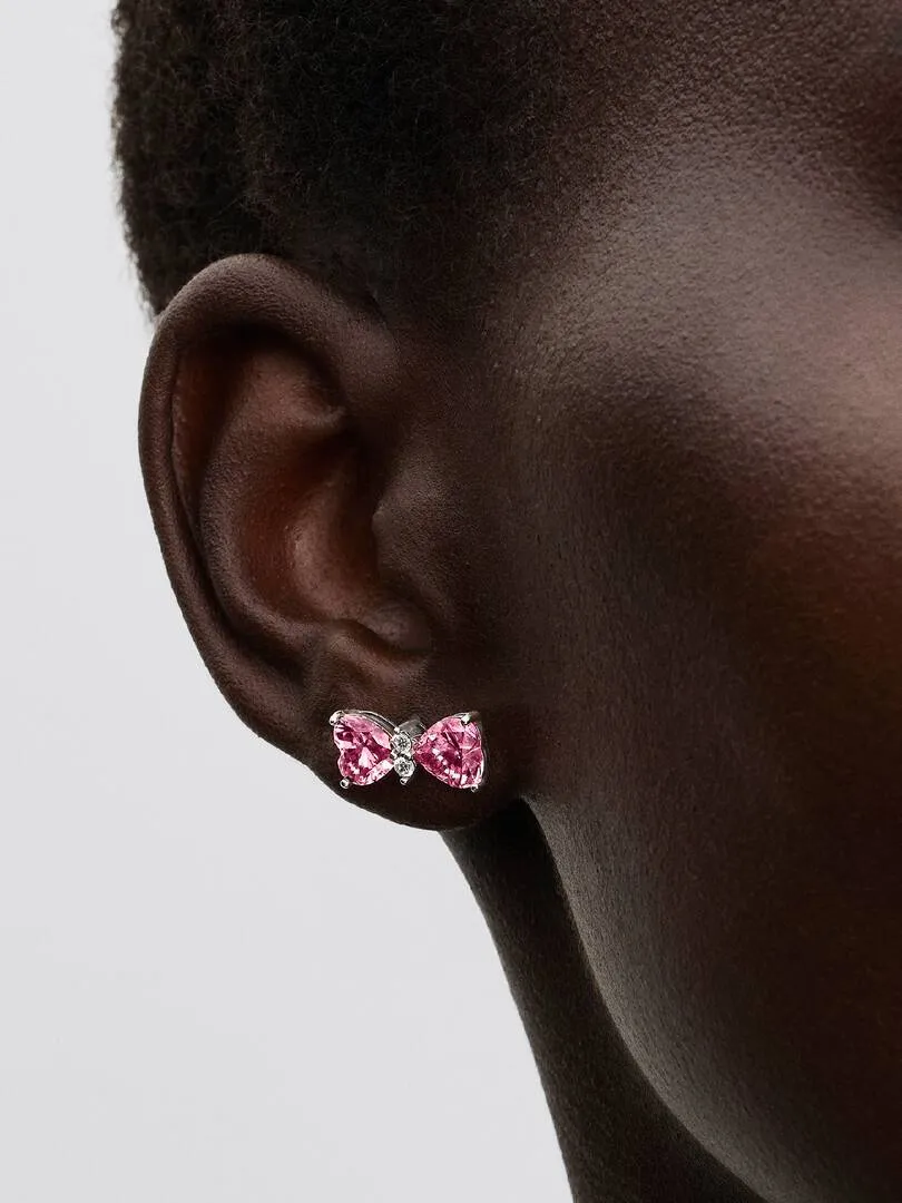 Bow sterling silver stud earrings with fancy pink 