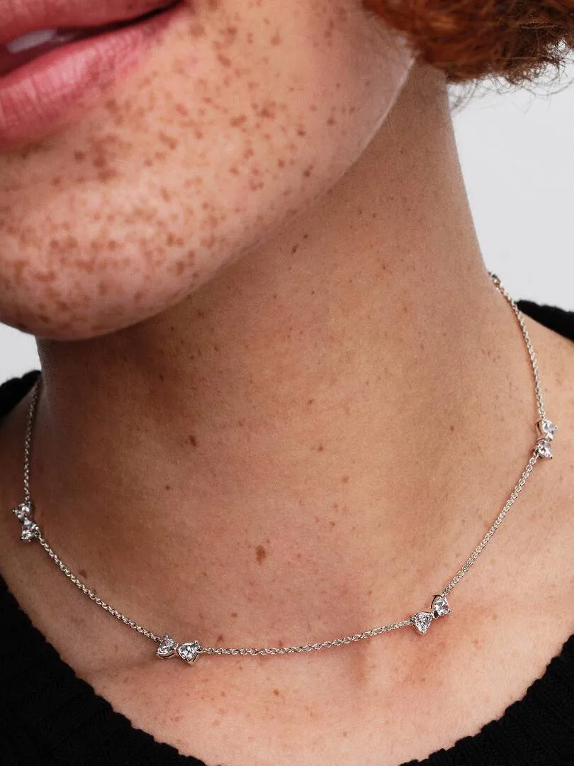 Bow sterling silver station chain necklace with cl