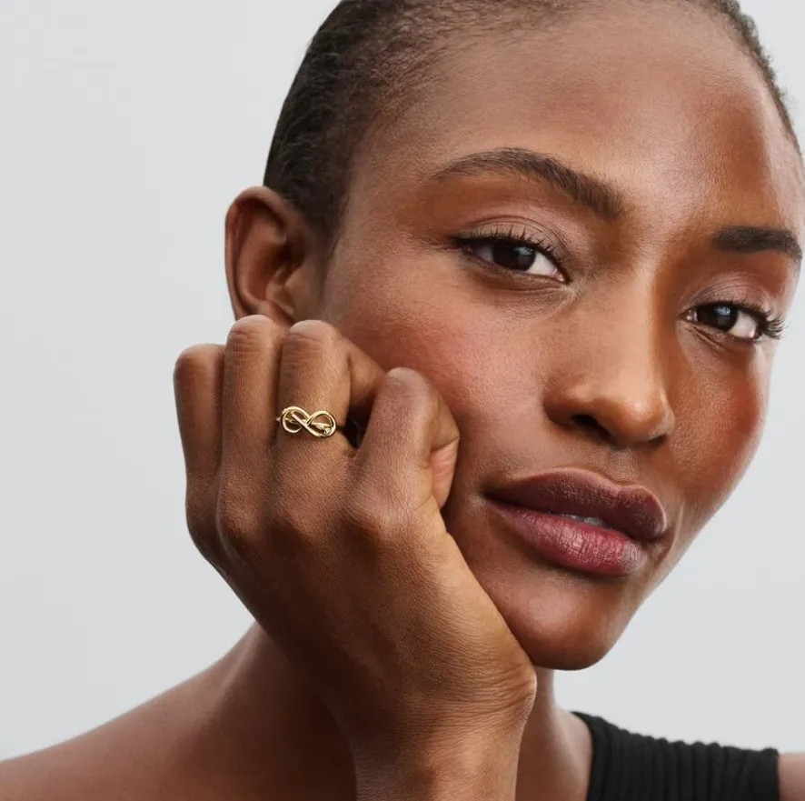 Infinity knot 14k gold-plated ring with clear cubi