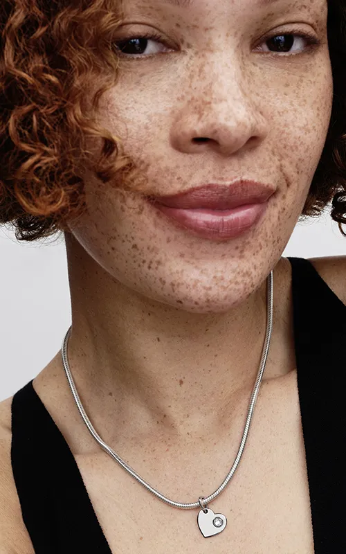 Engravable heart sterling silver dangle with clear