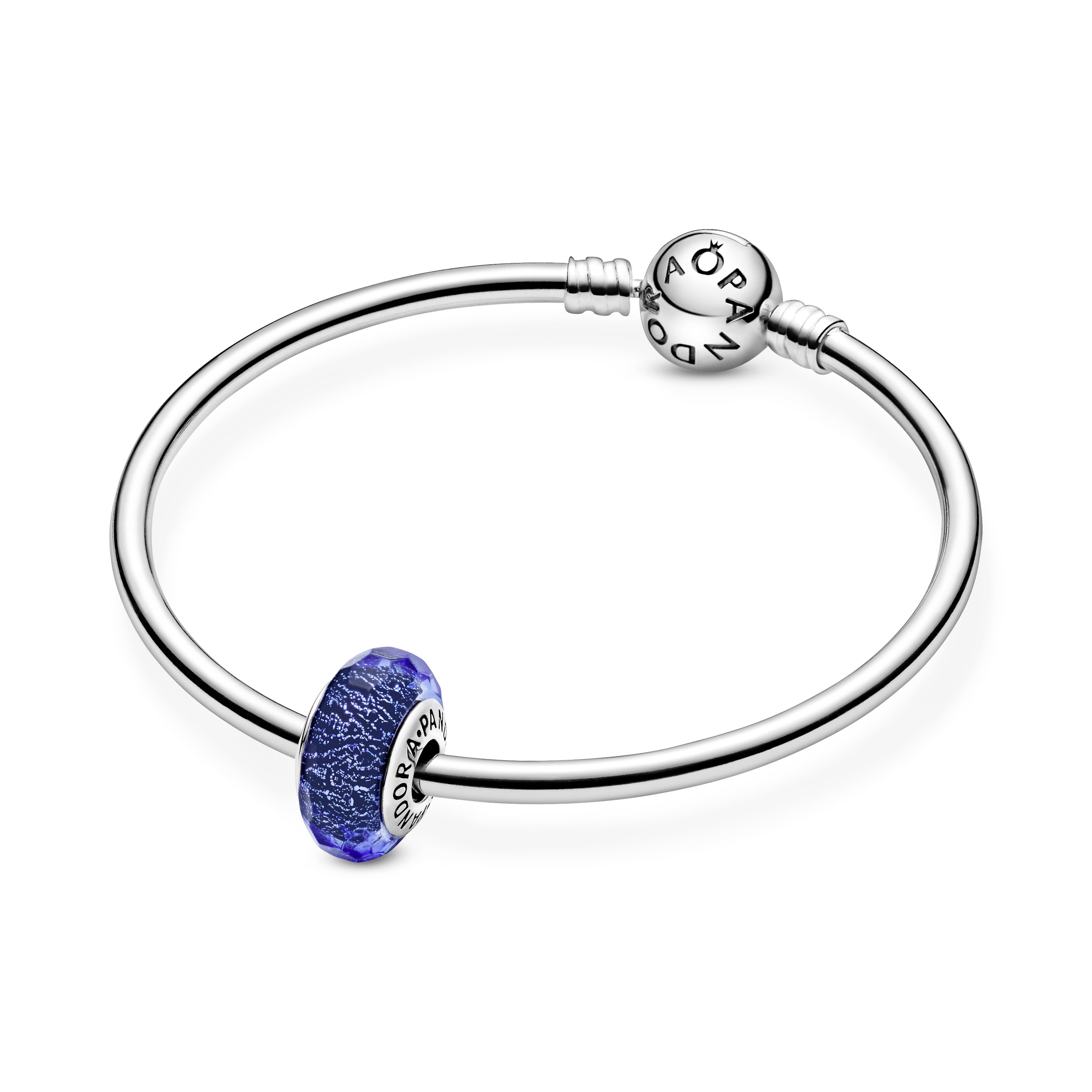 Abstract silver charm with faceted iridescent blue