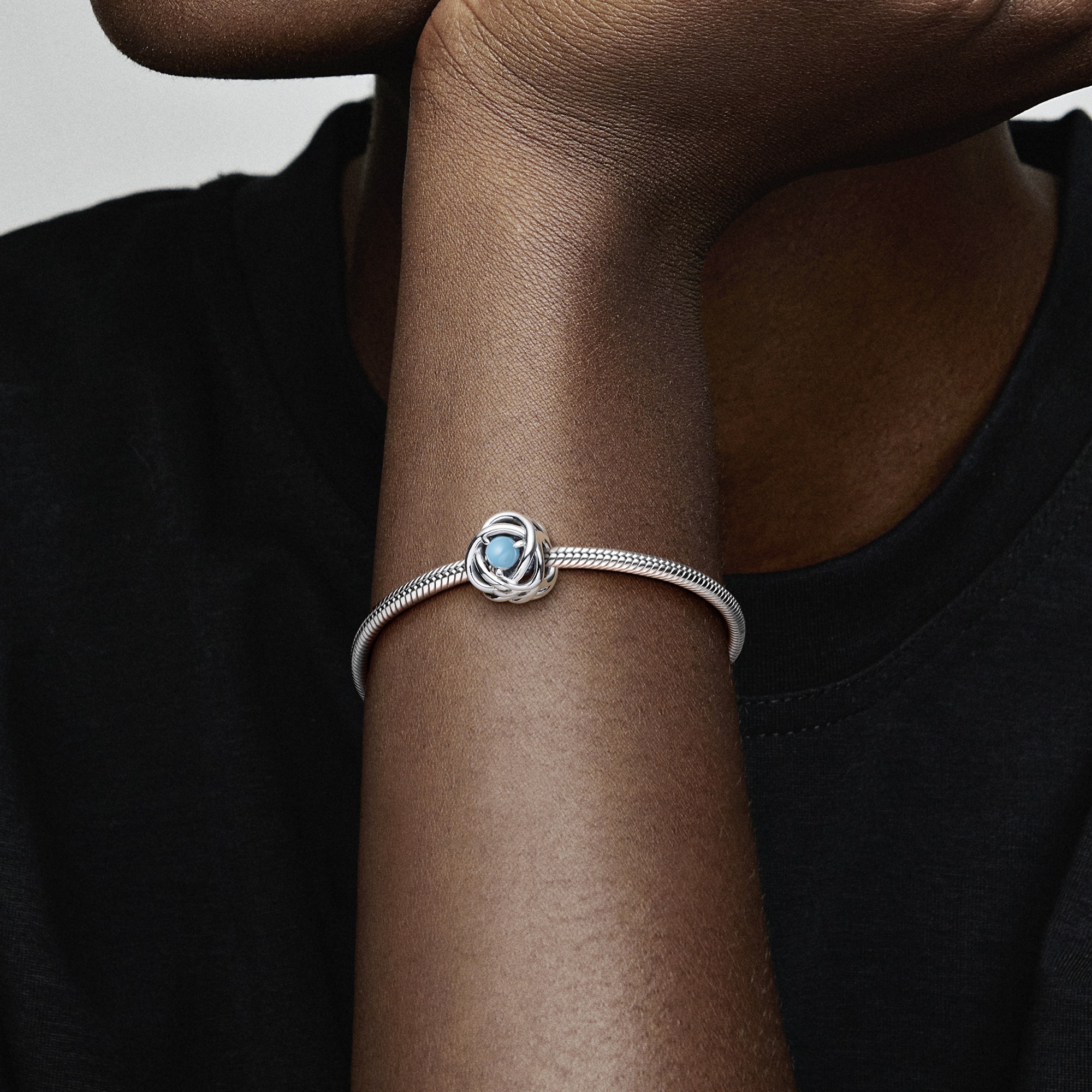 Sterling silver charm with capri blue crystal