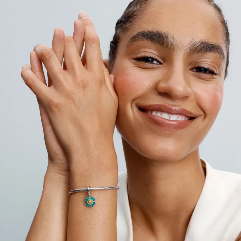 Spinnable clover sterling silver and 14k gold-plated dangle with 0.01 ct TW G-J VS+ round brilliant very good cut lab-grown diamond and blue/ 763624C01