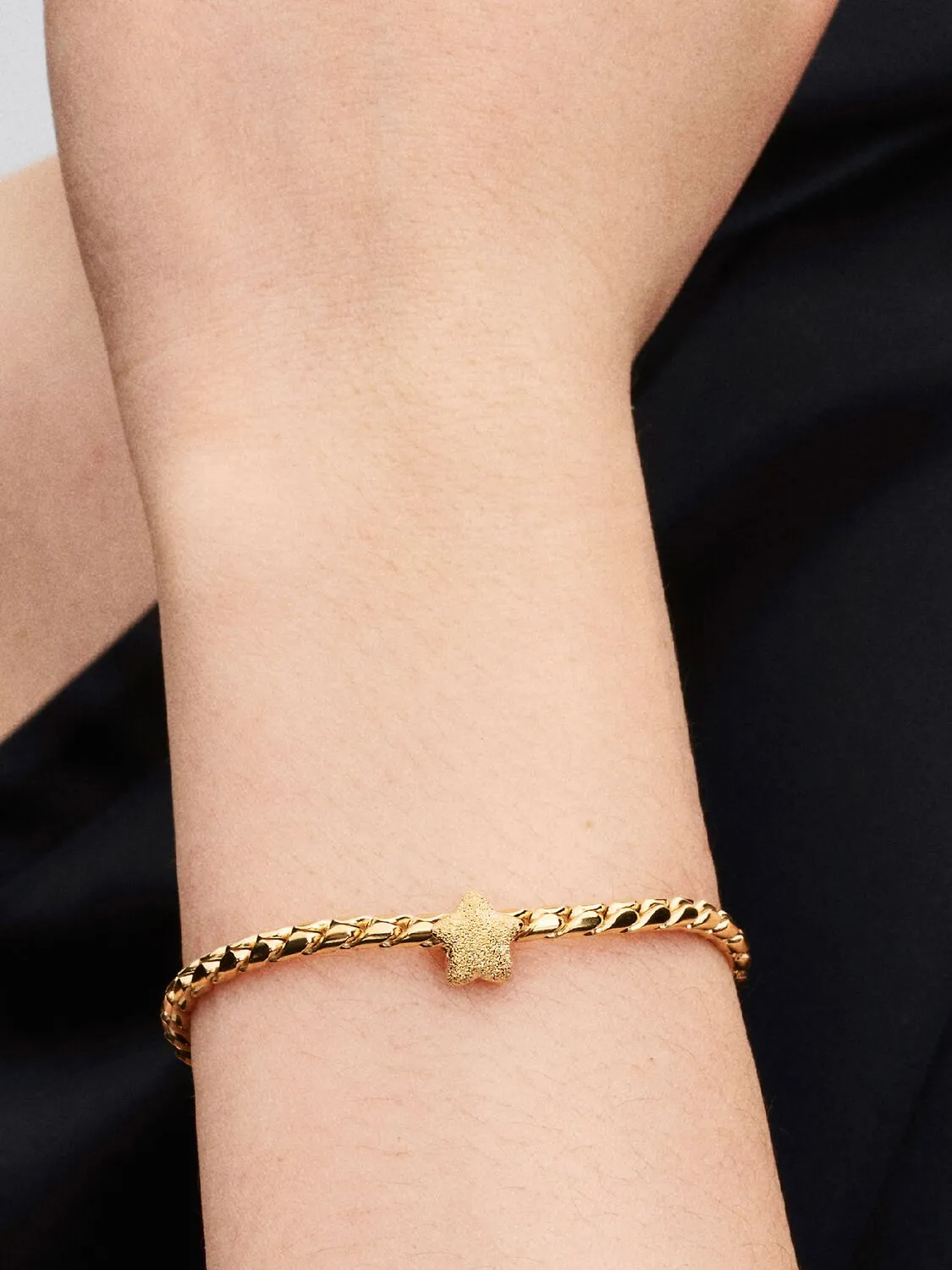 Textured star 14k gold-plated mini charm