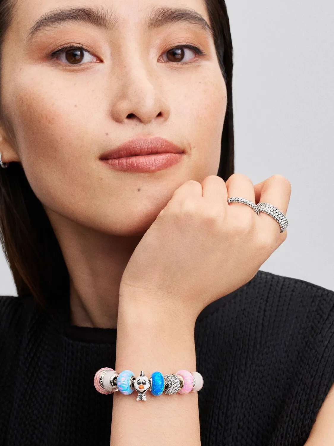 Disney Olaf sterling silver charm with orange, black and glittery white enamel and blue UV resin / 793978C01