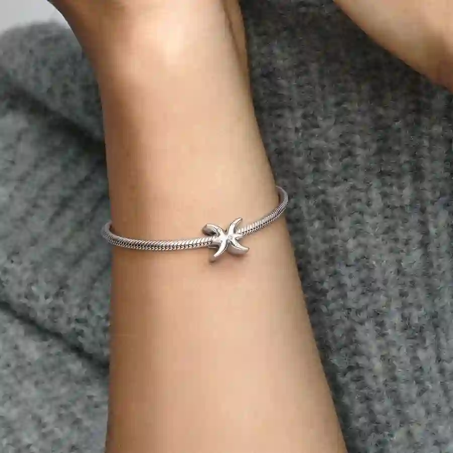 Pisces sterling silver charm with clear cubic zirc