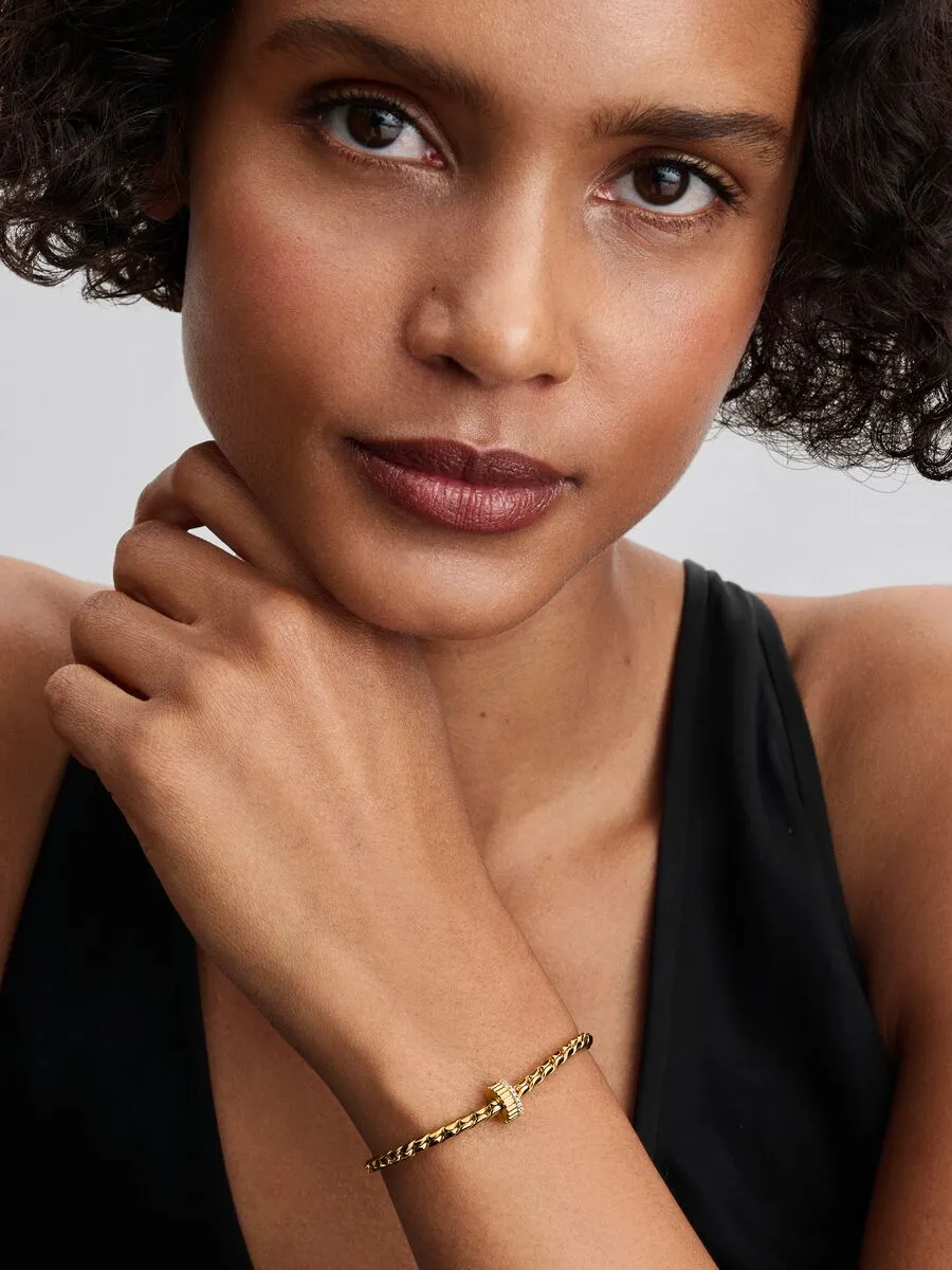 14k gold-plated clip with clear cubic zirconia and silicone grip / 764078C01