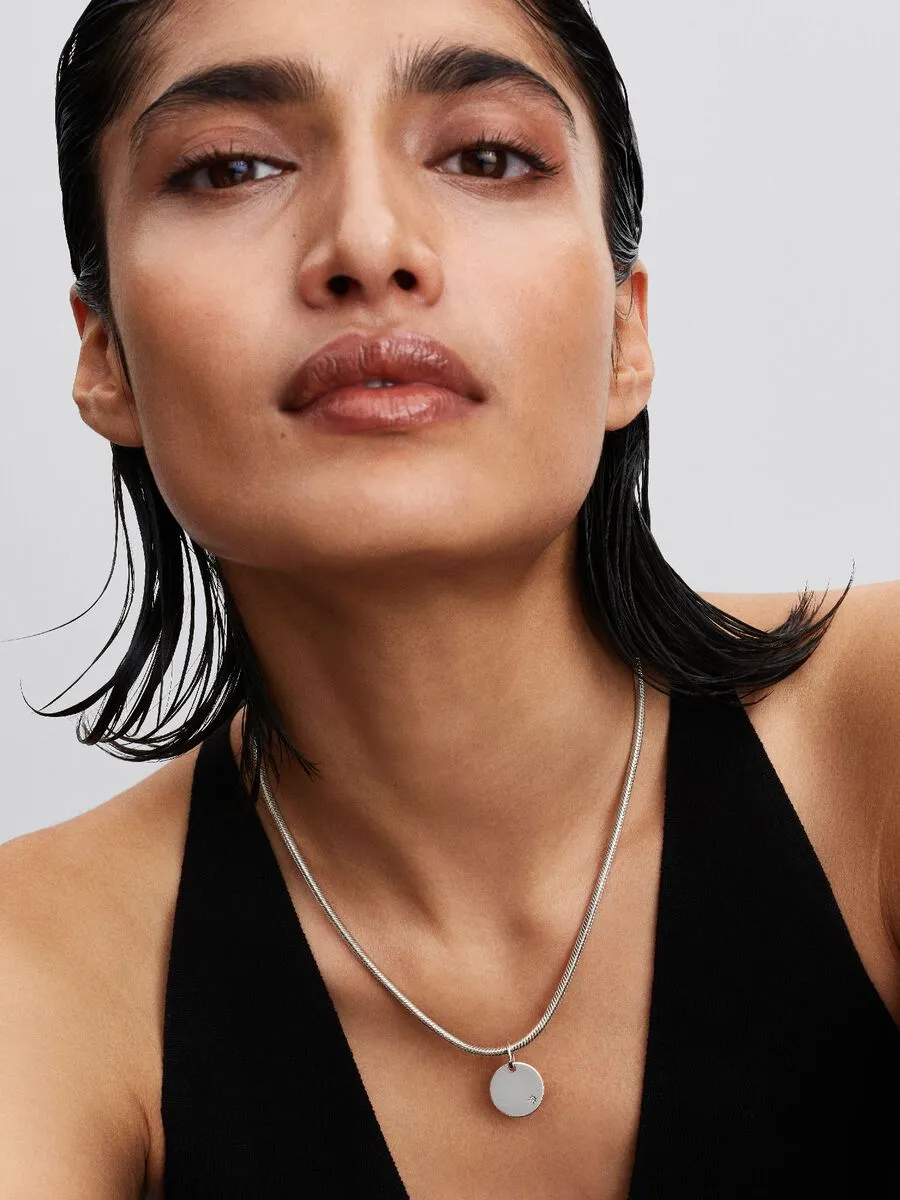 Engravable round sterling silver pendant with 0.012 ct TW G-I VS+ round brilliant very good cut lab-grown diamonds / 394012C01