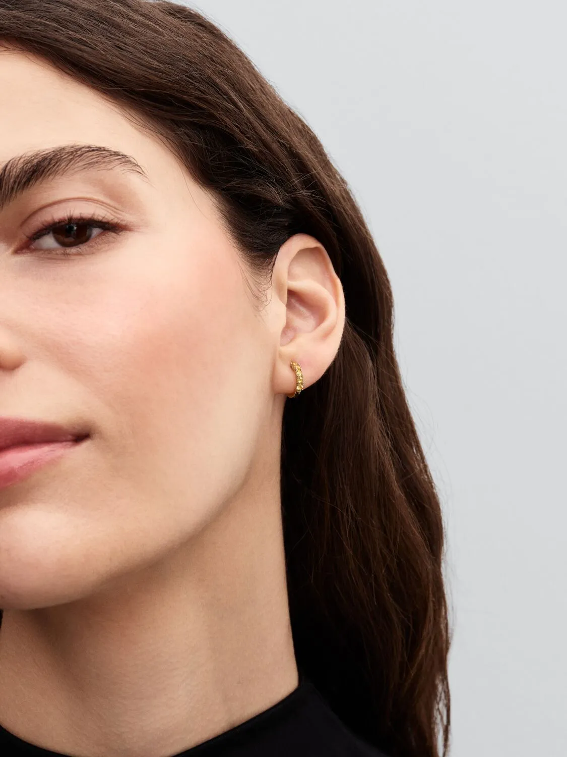 14k gold-plated huggie earrings with vibrant yello