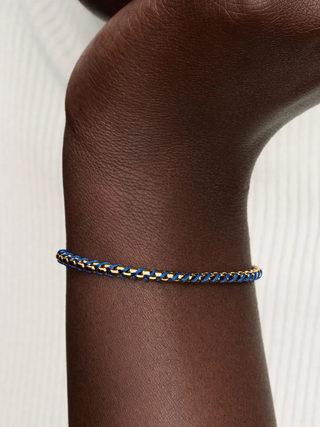 Braided 14k gold-plated box chain bracelet with bl