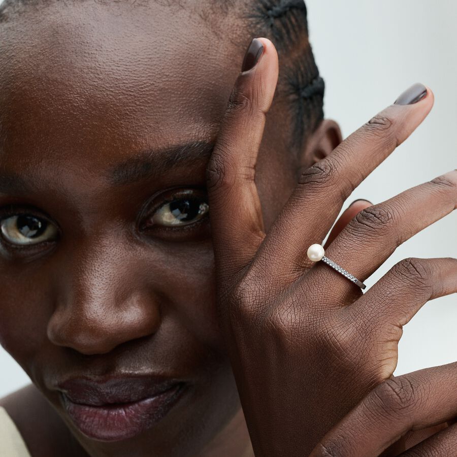 Sterling silver ring with white treated freshwater cultured pearl and clear cubic zirconia