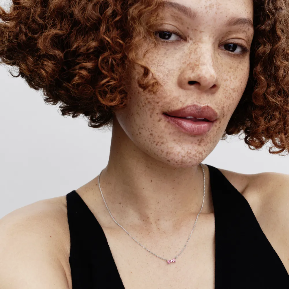 Bow sterling silver collier with fancy pink and cl