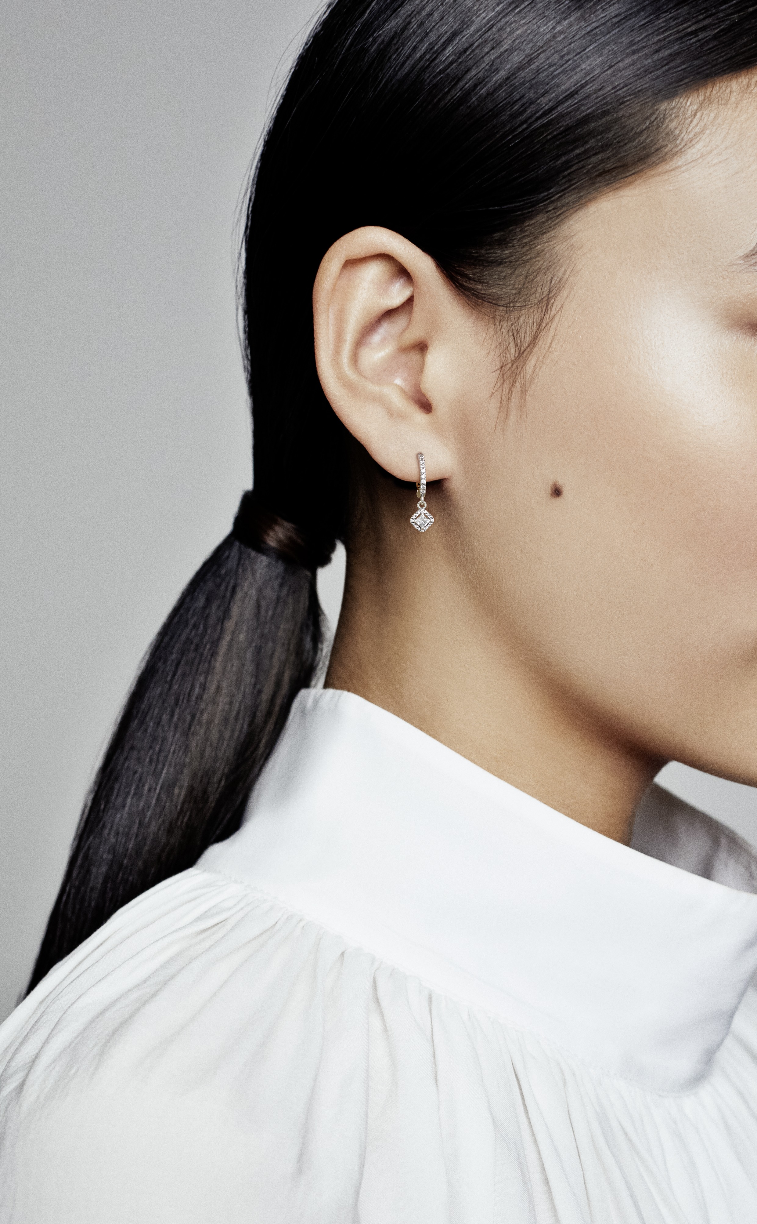 Sterling silver hoop earrings with clear cubic zir