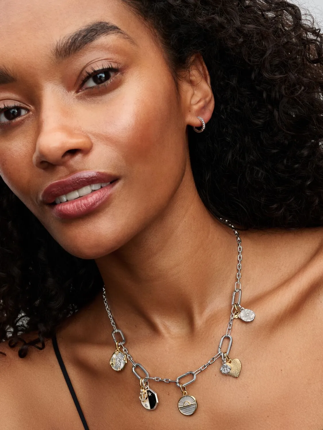 Sunrise 14k gold-plated medallion with white bioresin man-made mother of pearl and clear cubic zirconia/ 763859C01