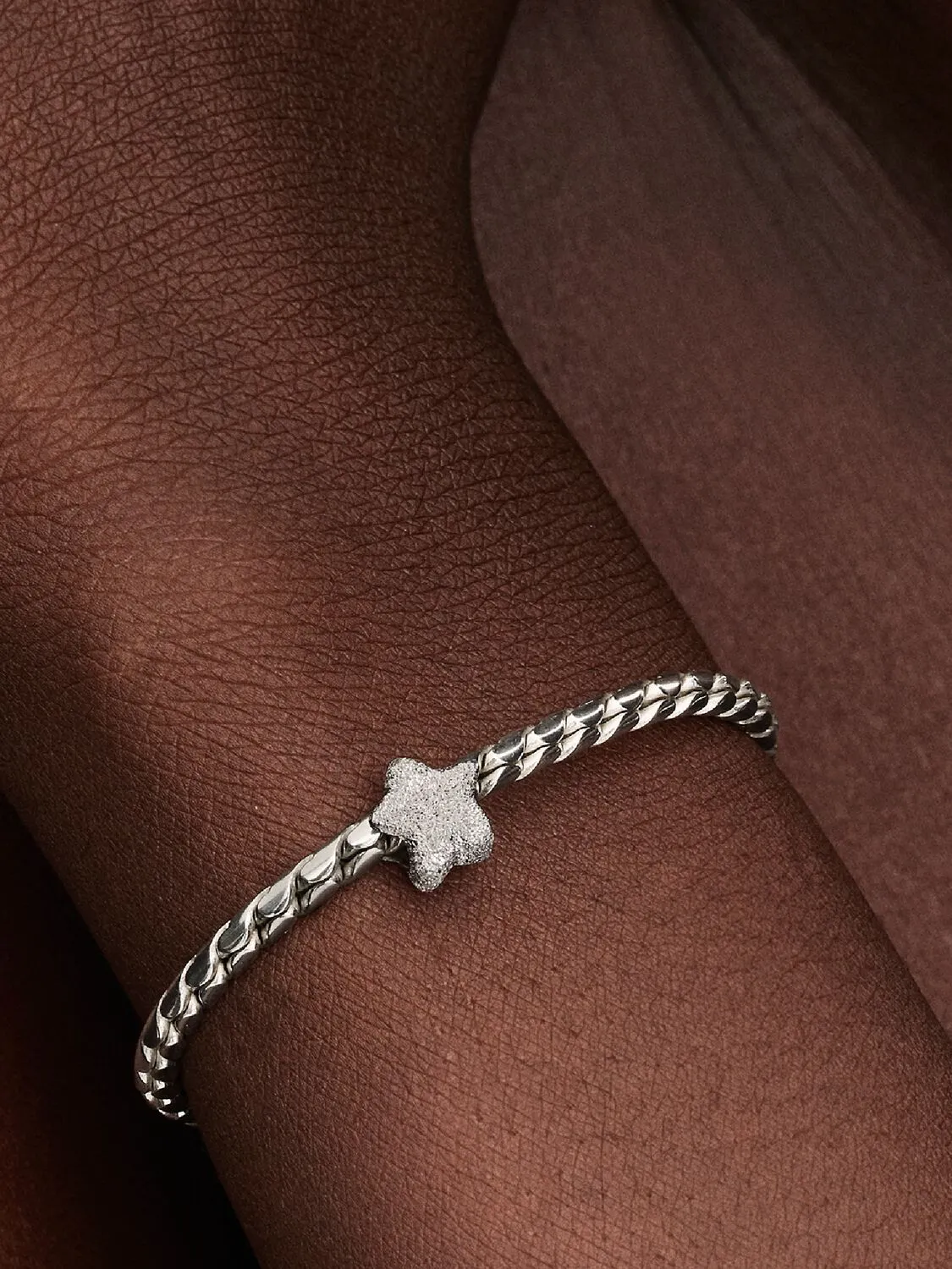 Textured star sterling silver mini charm
