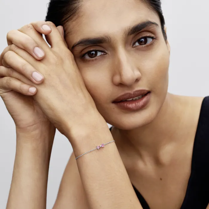 Bow sterling silver bracelet with fancy pink and c