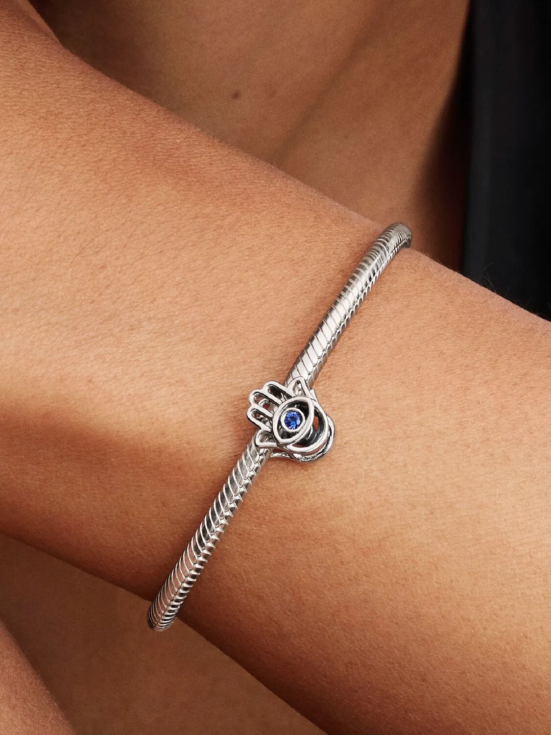 Hamsa hand sterling silver charm with stellar blue