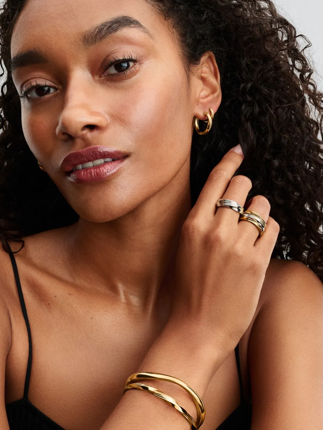 Twisted 14k gold-plated hoop earrings