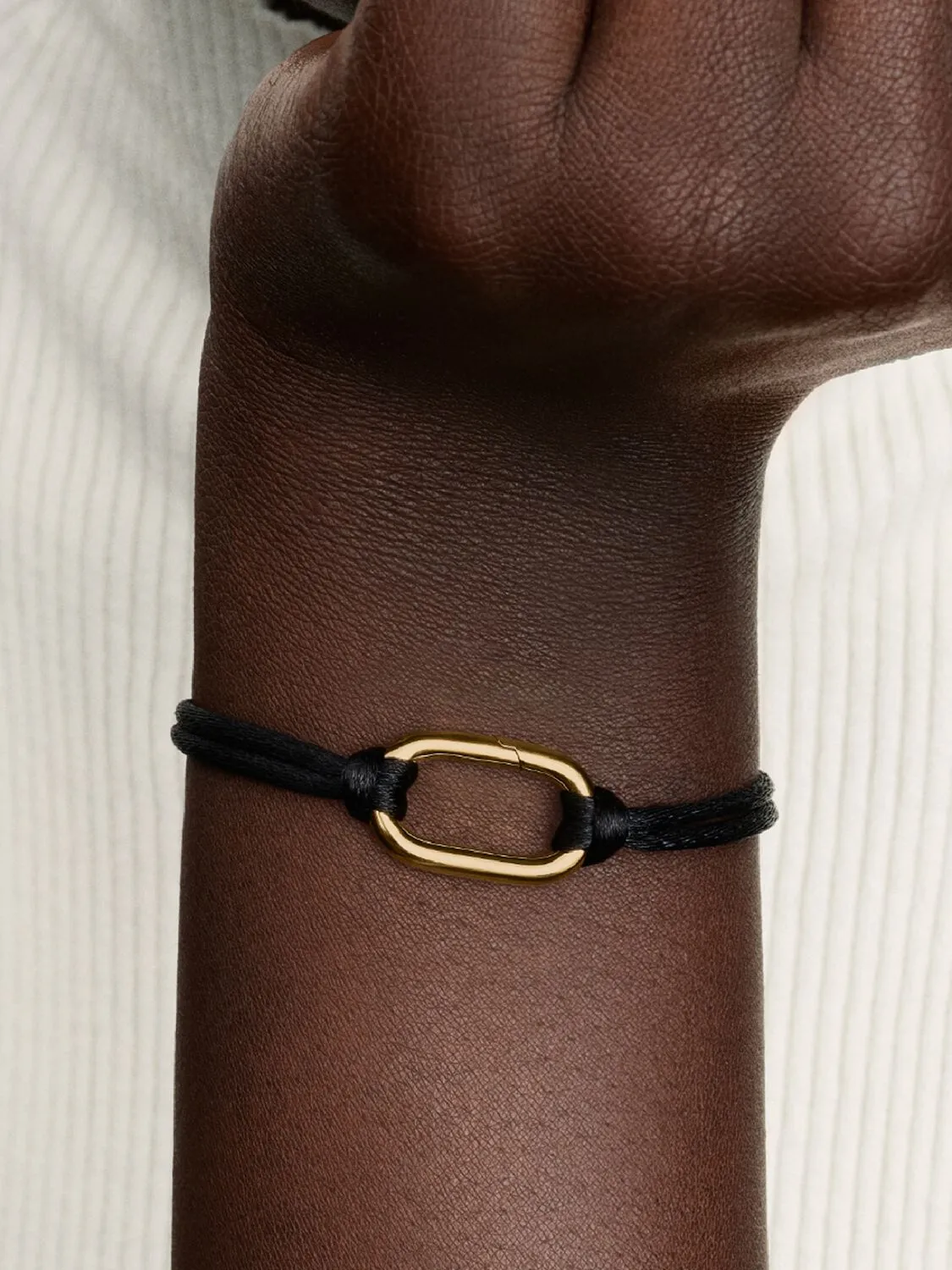 14k gold-plated bracelet with black cord