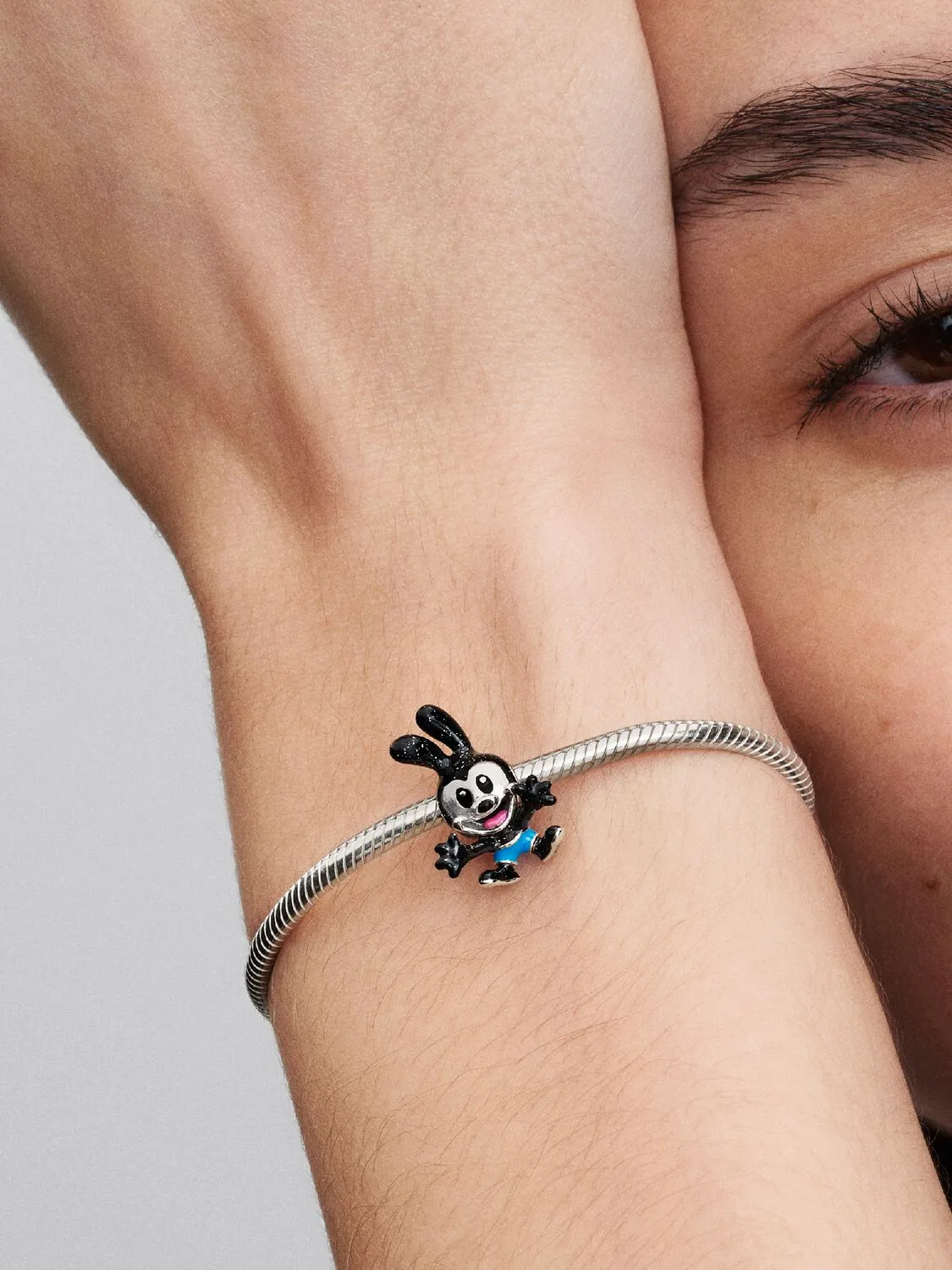 Disney Oswald sterling silver charm with red, blue